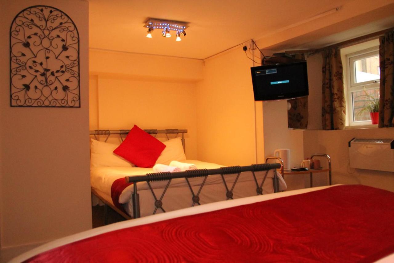 London Olympus Hotel Nirvana Habitación foto